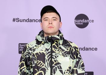 Liam O’Hanna Faces Terrorism Charge Over Hezbollah Flag Display Amid Political Controversy and Police Investigation